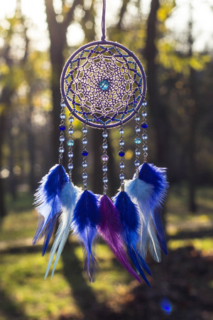 Dream catcher with feathers threads and beads rope hanging. Dreamcatcher handmadeの写真素材
