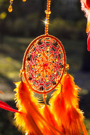 Dream catcher with feathers threads and beads rope hanging. Dreamcatcher handmadeの写真素材