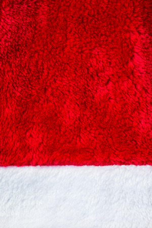 Close up red and white Santa Claus hat texture to backround.の写真素材