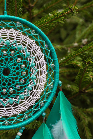 Dream catcher with feathers threads and beads rope hanging. Dreamcatcher handmadeの写真素材