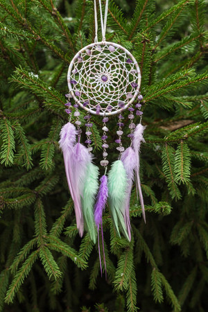Dream catcher with feathers threads and beads rope hanging. Dreamcatcher handmadeの写真素材