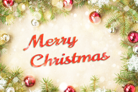 Merry Christmas and New Year typographical on holiday background with Xmas decoration, branch of fir tree and snow.の写真素材