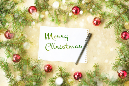 Merry Christmas and New Year typographical on holiday background with Xmas decoration, branch of fir tree and snow.の写真素材