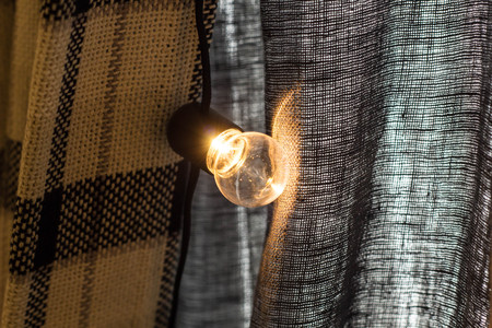 Close up light chain decoration with fabric background.の写真素材