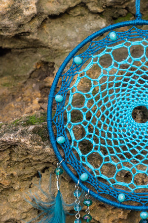 Dream catcher with feathers threads and beads rope hanging. Dreamcatcher handmadeの写真素材