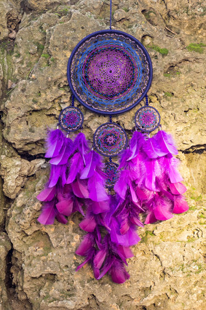 Dream catcher with feathers threads and beads rope hanging. Dreamcatcher handmadeの写真素材