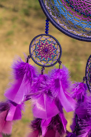Dream catcher with feathers threads and beads rope hanging. Dreamcatcher handmadeの写真素材