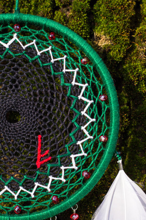 Dream catcher with feathers threads and beads rope hanging. Dreamcatcher handmadeの写真素材