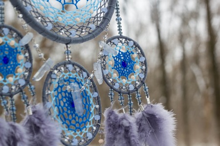 Dream catcher with feathers threads and beads rope hanging. Dreamcatcher handmadeの写真素材