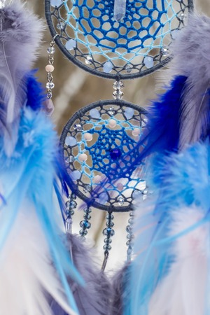 Dream catcher with feathers threads and beads rope hanging. Dreamcatcher handmade