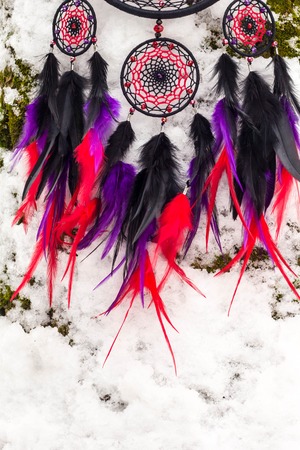 Dream catcher with feathers, threads and beads rope hanging.の写真素材