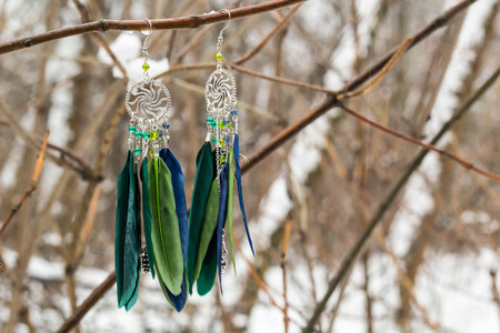 earrings of Dream catcher with feathers threads and beads rope hanging. Dreamcatcher handmade.の写真素材