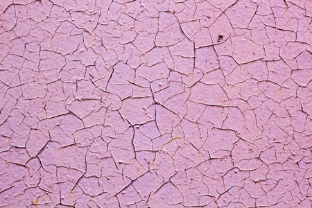 fragment of old pink wall with crack texture background