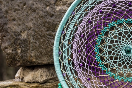 Dream catcher with feathers threads and beads rope hanging. Dreamcatcher handmadeの写真素材