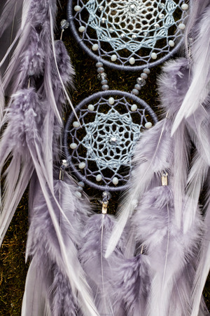 Dream catcher with feathers threads and beads rope hanging. Dreamcatcher handmadeの写真素材