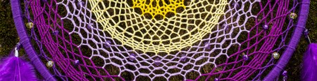 Banner of Dream catcher with feathers threads and beads rope hanging. Dreamcatcher handmade