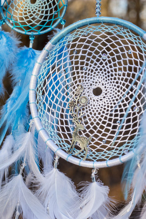 Dream catcher with feathers threads and beads rope hanging. Dreamcatcher handmadeの写真素材