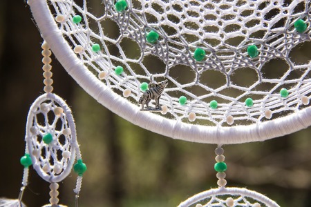 Dream catcher with feathers threads and beads rope hanging. Dreamcatcher handmadeの写真素材