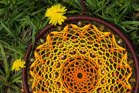 Dream catcher with feathers threads and beads rope hanging. Dreamcatcher handmade