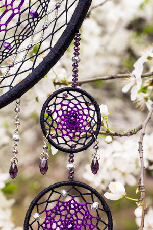 Dream catcher with feathers threads and beads rope hanging. Dreamcatcher handmadeの写真素材