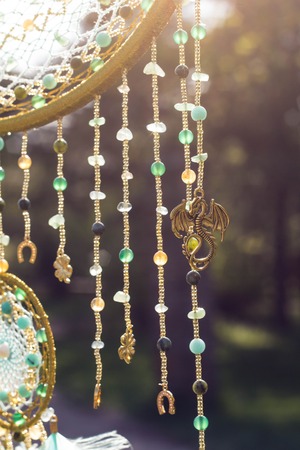 Dream catcher with feathers threads and beads rope hanging. Dreamcatcher handmade