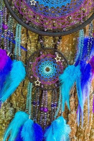 Dream catcher with feathers threads and beads rope hanging. Dreamcatcher handmadeの写真素材