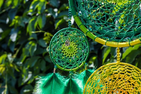 Dream catcher with feathers threads and beads rope hanging. Dreamcatcher handmade