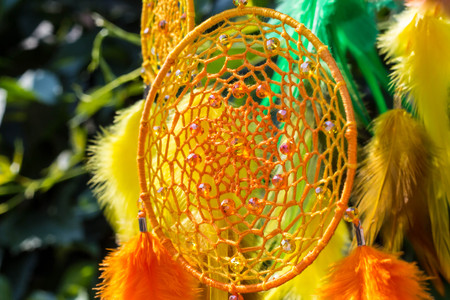 Dream catcher with feathers threads and beads rope hanging. Dreamcatcher handmade