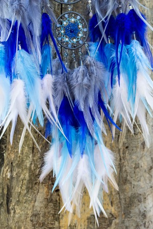Dream catcher with feathers threads and beads rope hanging. Dreamcatcher handmadeの写真素材