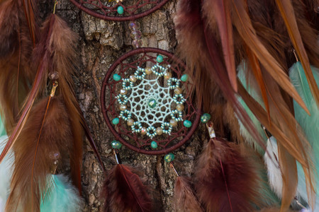 Dream catcher with feathers threads and beads rope hanging. Dreamcatcher handmadeの写真素材