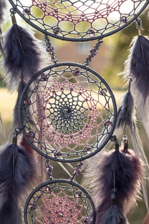 Dream catcher with feathers threads and beads rope hanging. Dreamcatcher handmadeの写真素材