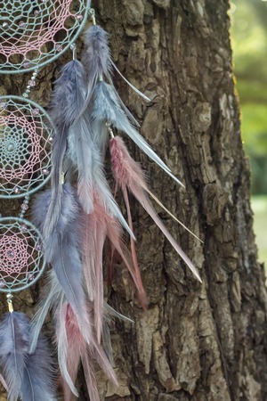 Dream catcher with feathers threads and beads rope hanging. Dreamcatcher handmadeの写真素材