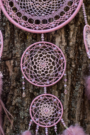 Dream catcher with feathers threads and beads rope hanging. Dreamcatcher handmadeの写真素材