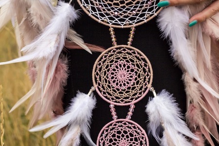 Dream catcher with feathers threads and beads rope hanging. Dreamcatcher handmadeの写真素材