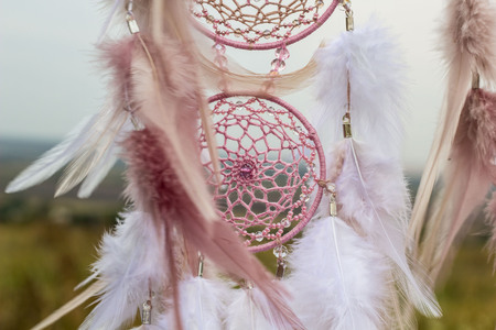 Dream catcher with feathers threads and beads rope hanging. Dreamcatcher handmadeの写真素材