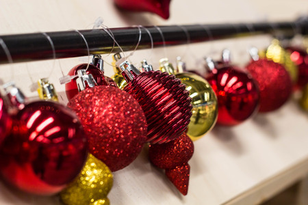 Christmas balls hanging over white background.の写真素材