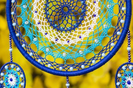 Dream catcher with feathers threads and beads rope hanging. Dreamcatcher handmadeの写真素材