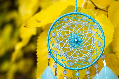Dream catcher with feathers threads and beads rope hanging. Dreamcatcher handmade