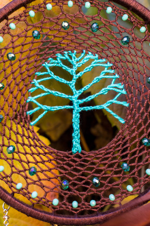 Dream catcher with feathers threads and beads rope hanging. Dreamcatcher handmadeの写真素材