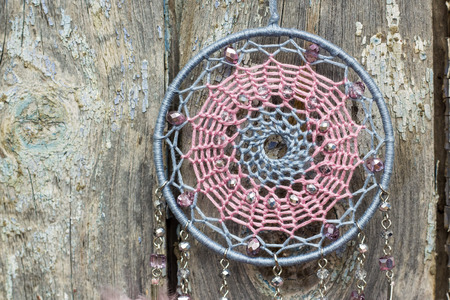 Dream catcher with feathers threads and beads rope hanging. Dreamcatcher handmade