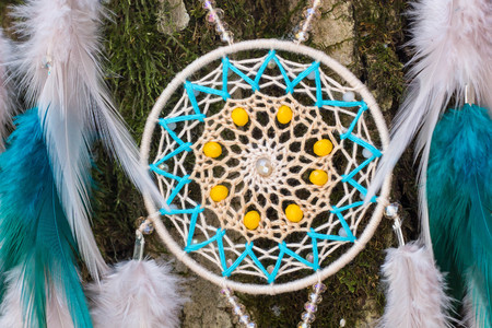 Dream catcher with feathers threads and beads rope hanging. Dreamcatcher handmadeの写真素材