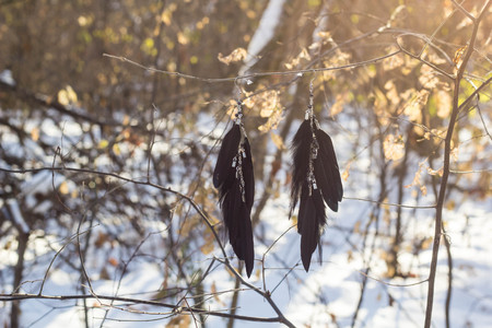 earrings of Dream catcher with feathers threads and beads rope hanging. Dreamcatcher handmadeの写真素材