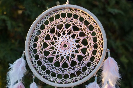 Dream catcher with feathers threads and beads rope hanging. Dreamcatcher handmadeの写真素材