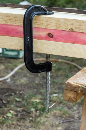 Bonding of wooden parts in the construction house outdoor