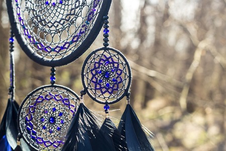 Dream catcher with feathers threads and beads rope hanging. Dreamcatcher handmadeの写真素材