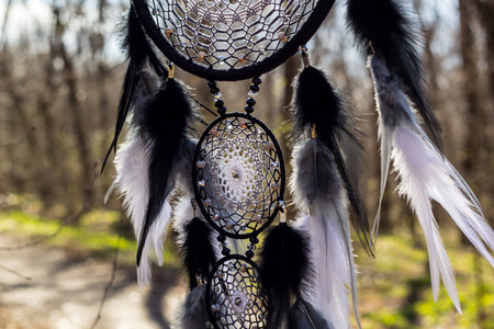 Dream catcher with feathers threads and beads rope hanging. Dreamcatcher handmade