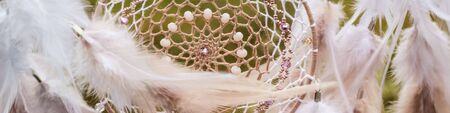 Banner of Dream catcher with feathers threads and beads rope hanging. Dreamcatcher handmadeの写真素材