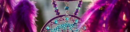 Banner of Dream catcher with feathers threads and beads rope hanging. Dreamcatcher handmadeの写真素材