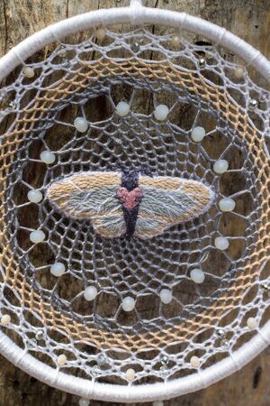 Dream catcher with feathers threads and beads rope hanging. Dreamcatcher handmade