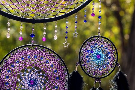 Dream catcher with feathers threads and beads rope hanging. Dreamcatcher handmadeの写真素材
